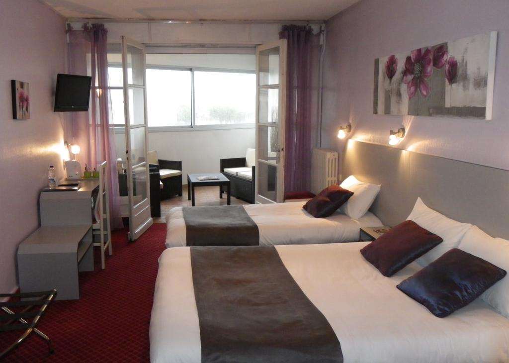 Brit Hotel Bleu Nuit Saintes Szoba fotó